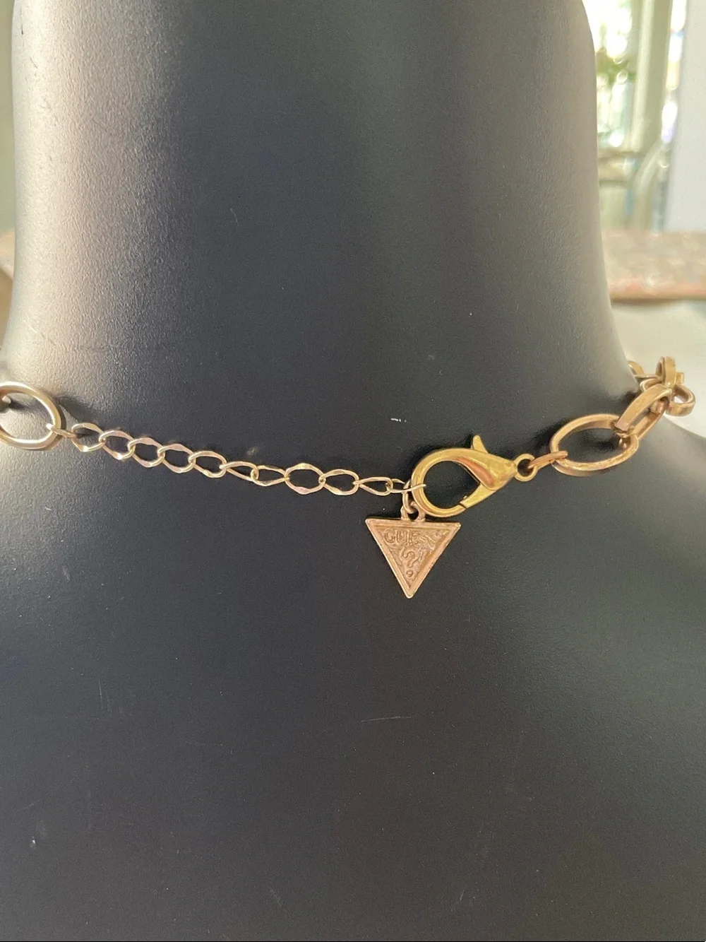 GUESS Gold Padlock Pendant with Floral Accent